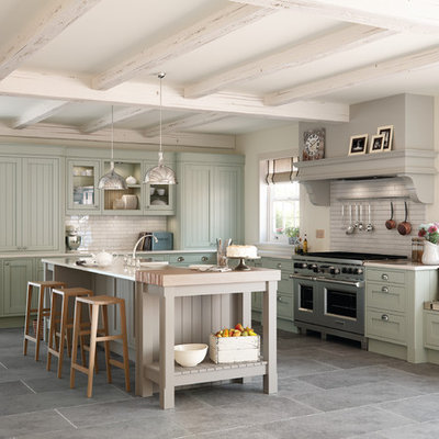 Kitchen - large contemporary l-shaped kitchen idea in Other with shaker cabinets, green cabinets, subway tile backsplash, stainless steel appliances and an island