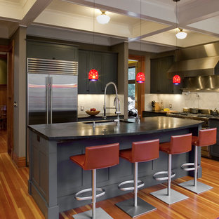 Traditional kitchen photos - Kitchen - traditional kitchen idea in Portland with shaker cabinets, gray cabinets, beige backsplash and stainless steel appliances