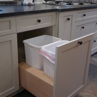 Design ideas for a large transitional kitchen in New York with a double-bowl sink, shaker cabinets, white cabinets, soapstone benchtops, grey splashback, stone tile splashback, slate floors and with island.