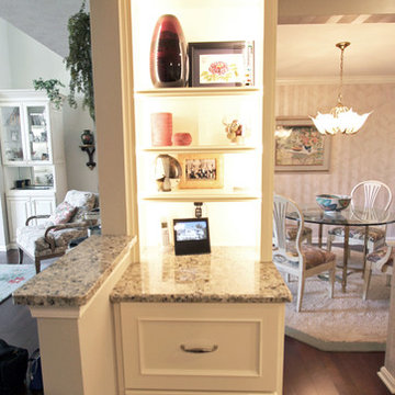 Medallion Painted White Chocolate Kitchen Cabinets with Petal Mosaic Backsplash