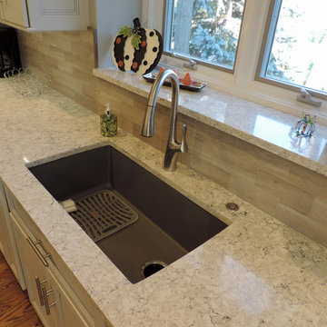 Medallion White with pewter highlights/Smoke Maple island and Aria quartz Kitche