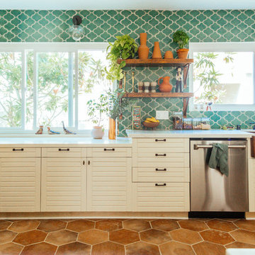 Mediterranean Tile Kitchen Backsplash with Terracotta Floor