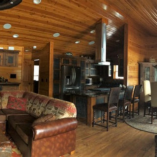 Inspiration for a large country l-shaped eat-in kitchen in Other with a double-bowl sink, louvered cabinets, light wood cabinets, granite benchtops, stainless steel appliances, slate floors, with island and multi-coloured floor.