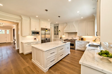 Kitchen - traditional kitchen idea in San Francisco with marble countertops