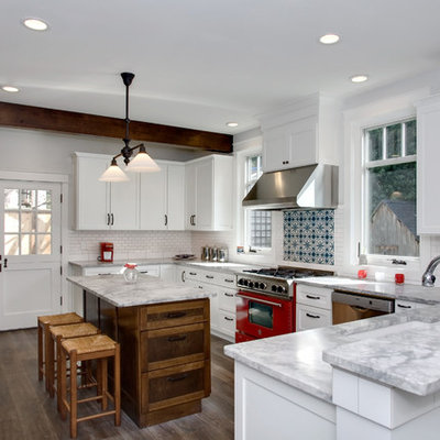 Kitchen - mid-sized traditional u-shaped kitchen idea in Seattle with colored appliances