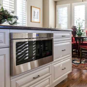 Microwave Drawer in this Luxurious White Kitchen in Greenwood Village