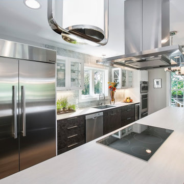 Miinus Eco-Friendly Kitchen featuring Stainless Steel Appliances.