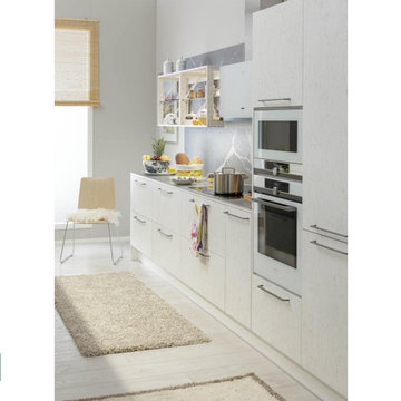Miinus White Eco-Friendly Kitchen Units with Integrated Oven.