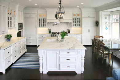 Large elegant eat-in kitchen photo in San Francisco with an island