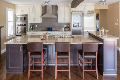 Example of a large transitional single-wall medium tone wood floor eat-in kitchen design in Toronto with a double-bowl sink, recessed-panel cabinets, medium tone wood cabinets, quartz countertops, gray backsplash, ceramic backsplash, stainless steel appliances and an island