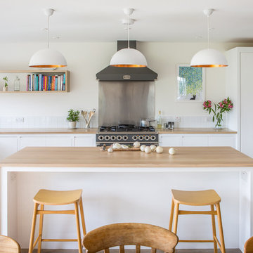 Minimalist White Kitchen with Warm Accents