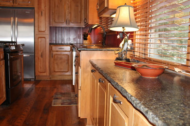 Example of a mountain style kitchen design in Milwaukee