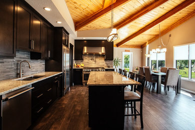 This is an example of a rustic kitchen in Calgary.