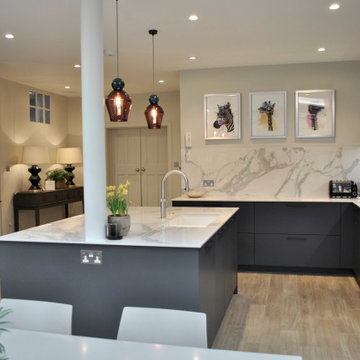 Modern and an elegant kitchen in dark grey with stunning worktop