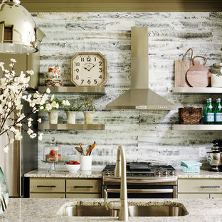 Mid-sized country galley kitchen in Atlanta with granite benchtops, stainless steel appliances, an undermount sink, multi-coloured splashback and open cabinets.