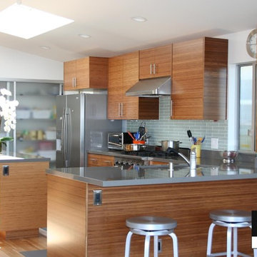 Modern carbonized bamboo kitchen with quartz countertops