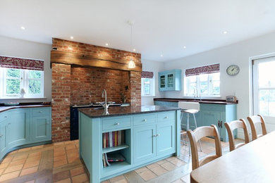 This is an example of a farmhouse kitchen in Hertfordshire.