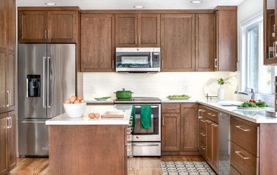 12 Kitchens That Wow With Wood Cabinets