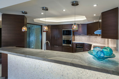 Inspiration for a large contemporary u-shaped marble floor open concept kitchen remodel in Tampa with a single-bowl sink, flat-panel cabinets, dark wood cabinets, quartzite countertops, paneled appliances, beige backsplash and a peninsula