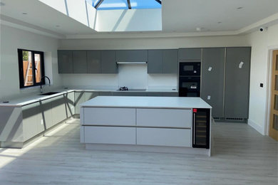 Modern Extension - White Kitchen with Skylights