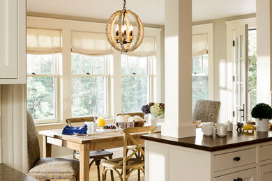 Example of a large minimalist light wood floor open concept kitchen design in Providence