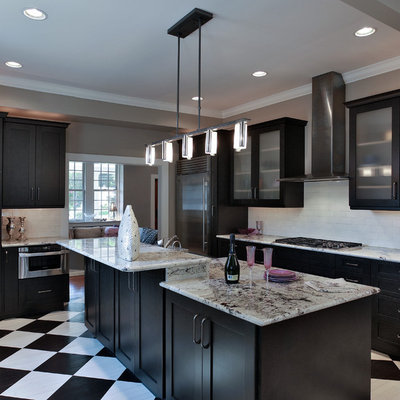 Transitional l-shaped painted wood floor and multicolored floor kitchen photo in Baltimore with glass-front cabinets, white backsplash, subway tile backsplash and stainless steel appliances