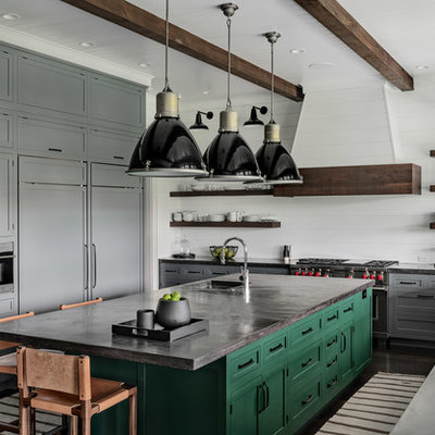 Inspiration for a large cottage u-shaped dark wood floor and brown floor kitchen remodel in New York with a single-bowl sink, shaker cabinets, gray cabinets, concrete countertops, white backsplash, wood backsplash, stainless steel appliances, an island and black countertops