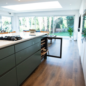 Modern Green and White Handleless Kitchen