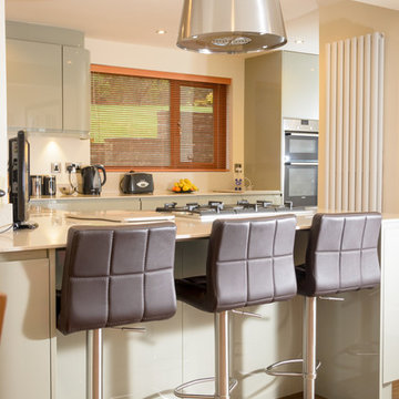 Modern, Handleless style kitchen with breakfast bar.