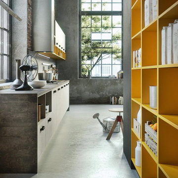 Modern industrial grey kitchen with yellow shelves