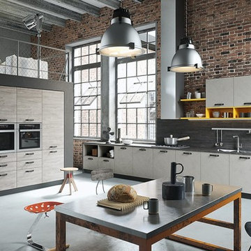 Modern industrial grey kitchen with yellow shelves