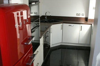 Photo of a modern kitchen in Berkshire.