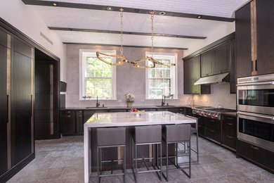Example of a huge minimalist u-shaped ceramic tile eat-in kitchen design in New York with a drop-in sink, shaker cabinets, dark wood cabinets, stainless steel appliances and an island