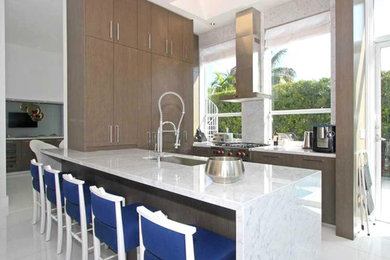 Inspiration for a large contemporary u-shaped ceramic tile and white floor eat-in kitchen remodel in Miami with a single-bowl sink, flat-panel cabinets, dark wood cabinets, marble countertops, gray backsplash, marble backsplash, stainless steel appliances, a peninsula and gray countertops