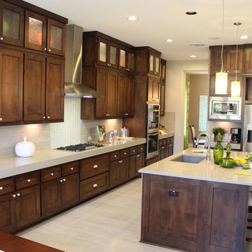 Modern kitchen cabinets with dark stain by Burrows Cabinets