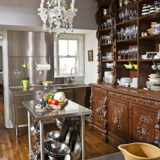 Design ideas for an eclectic kitchen in Other with stainless steel benchtops, an integrated sink, open cabinets, dark wood cabinets, metallic splashback and metal splashback.