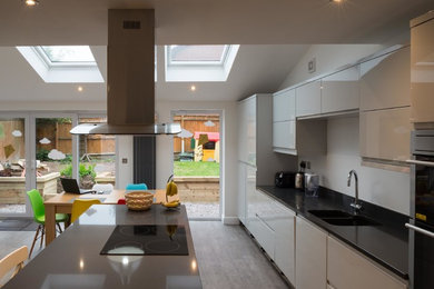 Medium sized modern kitchen in West Midlands.