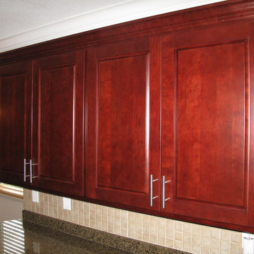 Modern Kitchen Remodel Done In a Cherry Veneer and Burgundy Stain