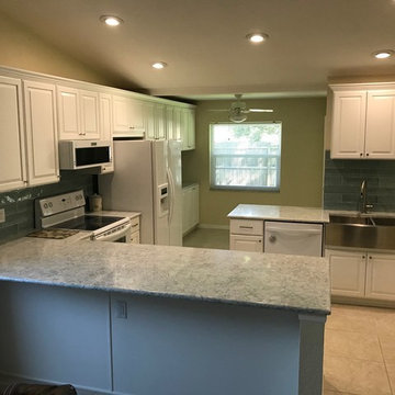 Modern Kitchen Remodel Done In A Snow White Paint