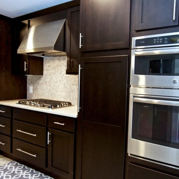 Modern kitchen with dark stained cabinetry