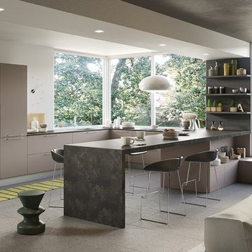 Modern kitchen with light beige cabinets and dark brown shelves