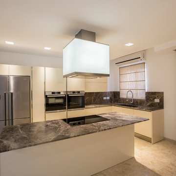 Modern kitchen with marble counter-top and back-splash