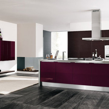 Modern kitchen with mauve and chocolate colored cabinets