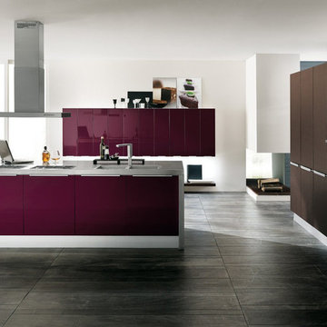 Modern kitchen with mauve and chocolate colored cabinets