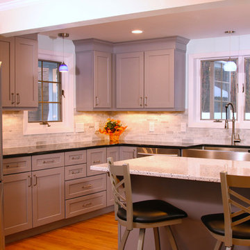 Modern Kitchen with uniquely styled Gray Cabinetry