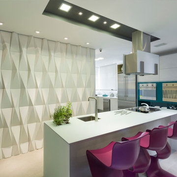 Modern kitchen with white concrete wall