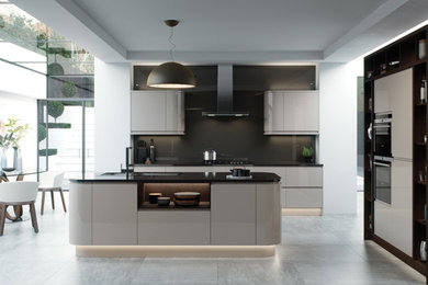 Photo of a modern open plan kitchen in Other with flat-panel cabinets, granite worktops, stainless steel appliances and an island.