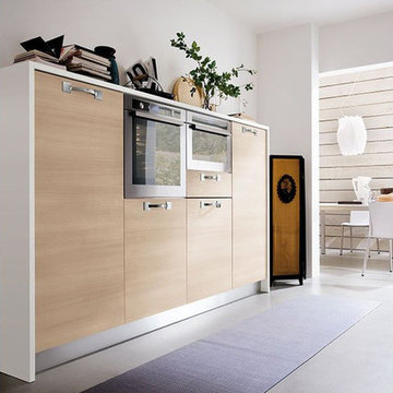 Modern light wood and white kitchen