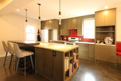 Mid-sized minimalist single-wall eat-in kitchen photo in Toronto with an undermount sink, flat-panel cabinets, dark wood cabinets, quartz countertops, red backsplash, glass tile backsplash, white appliances and an island