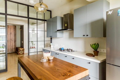 This is an example of a scandi kitchen in Mumbai.